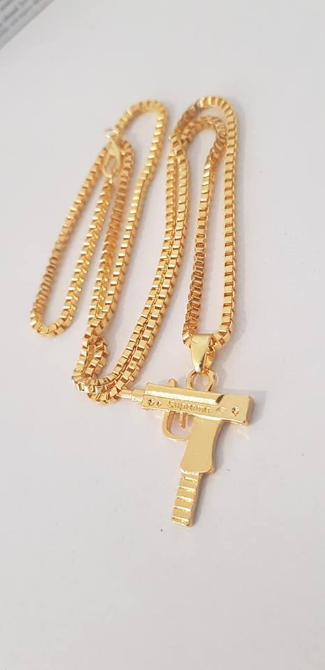 Supreme gun cheap necklace